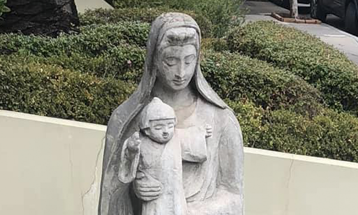 Statue of Mary and Baby Jesus in the courtyard of St. Benedict Parish